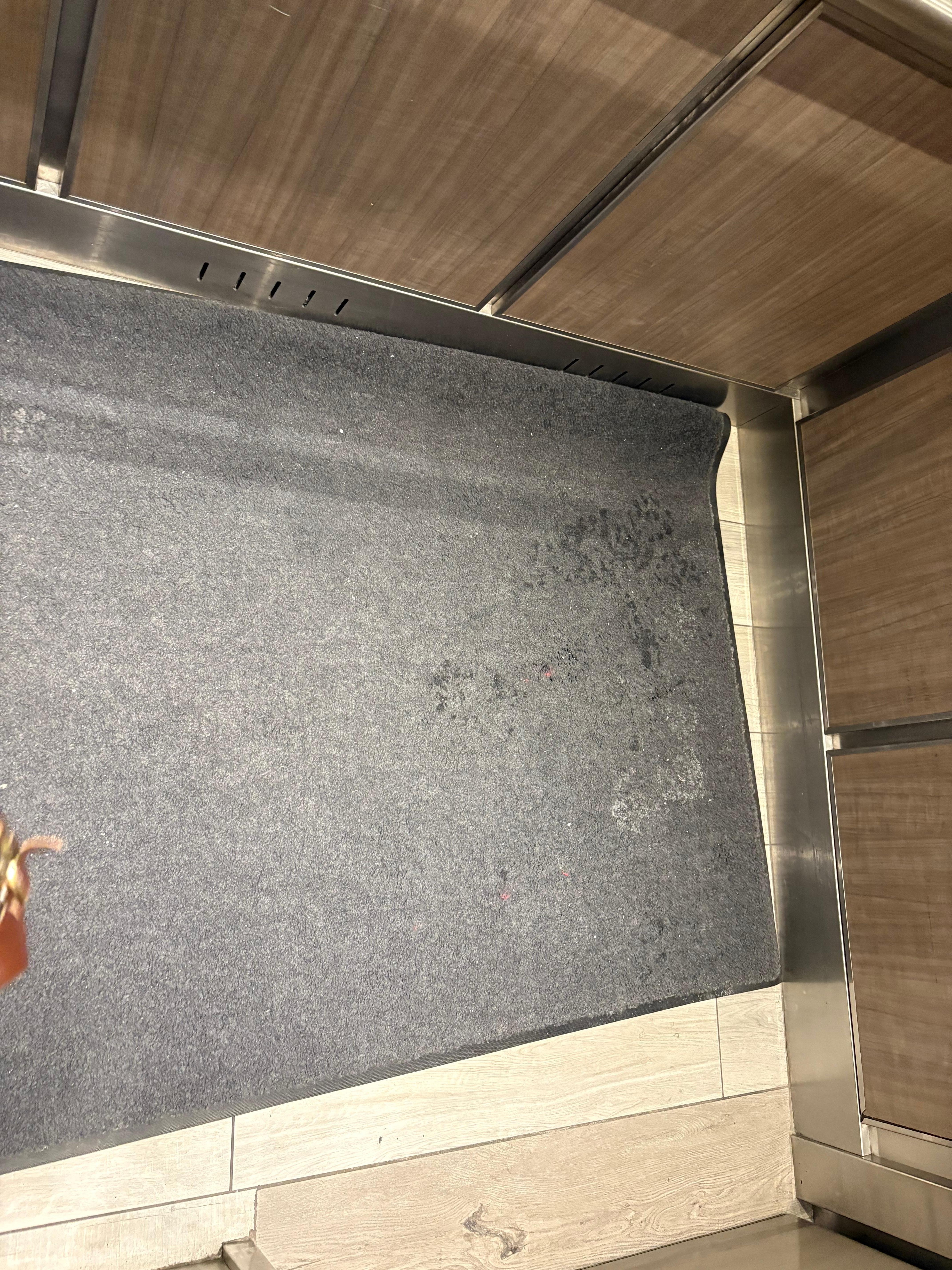 Dirty floors in elevator.  Not just salt but actual garbage.