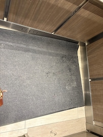 Dirty floors in elevator. Not just salt but actual garbage.