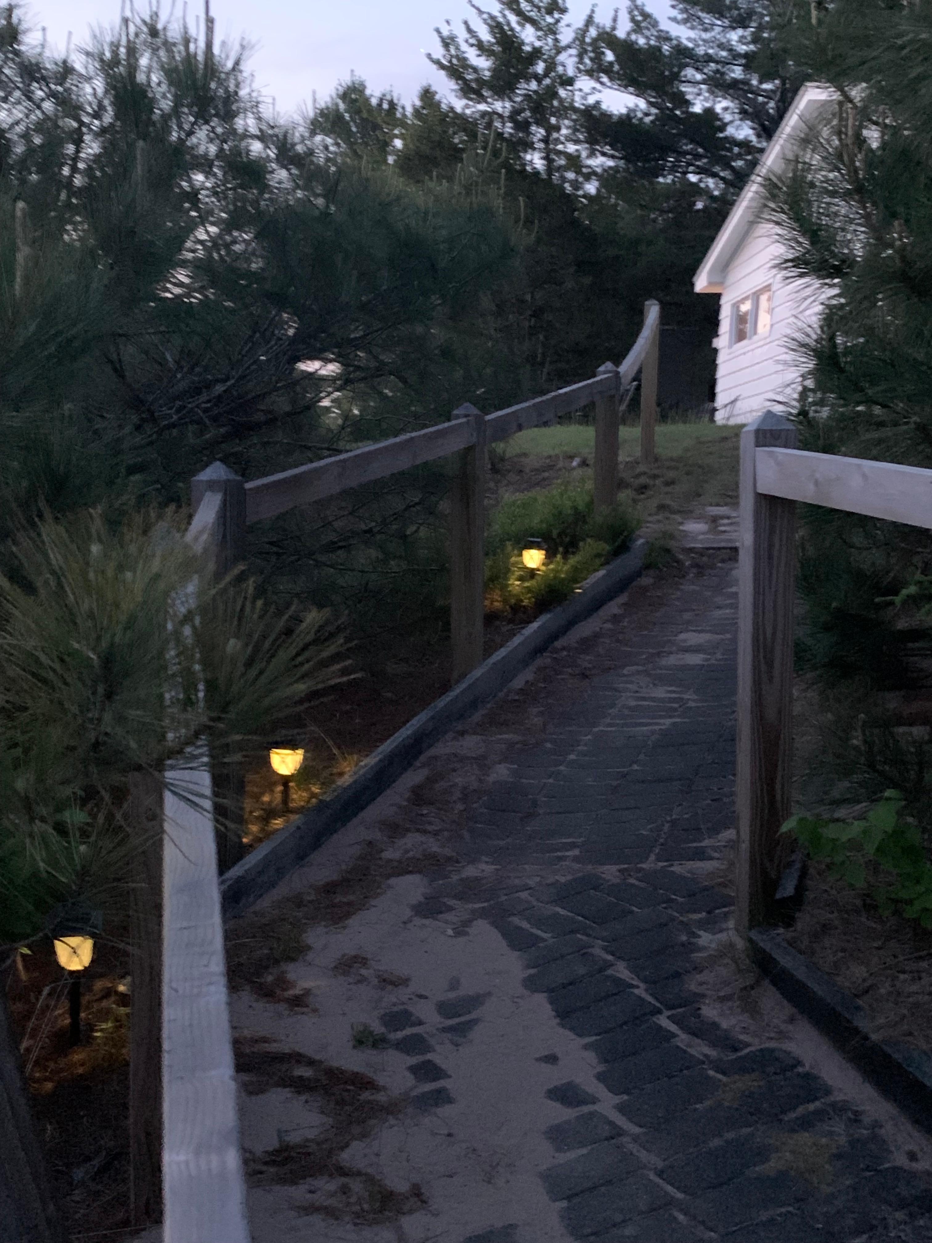 Another view of the lighted steps which shows how close they are to the house.