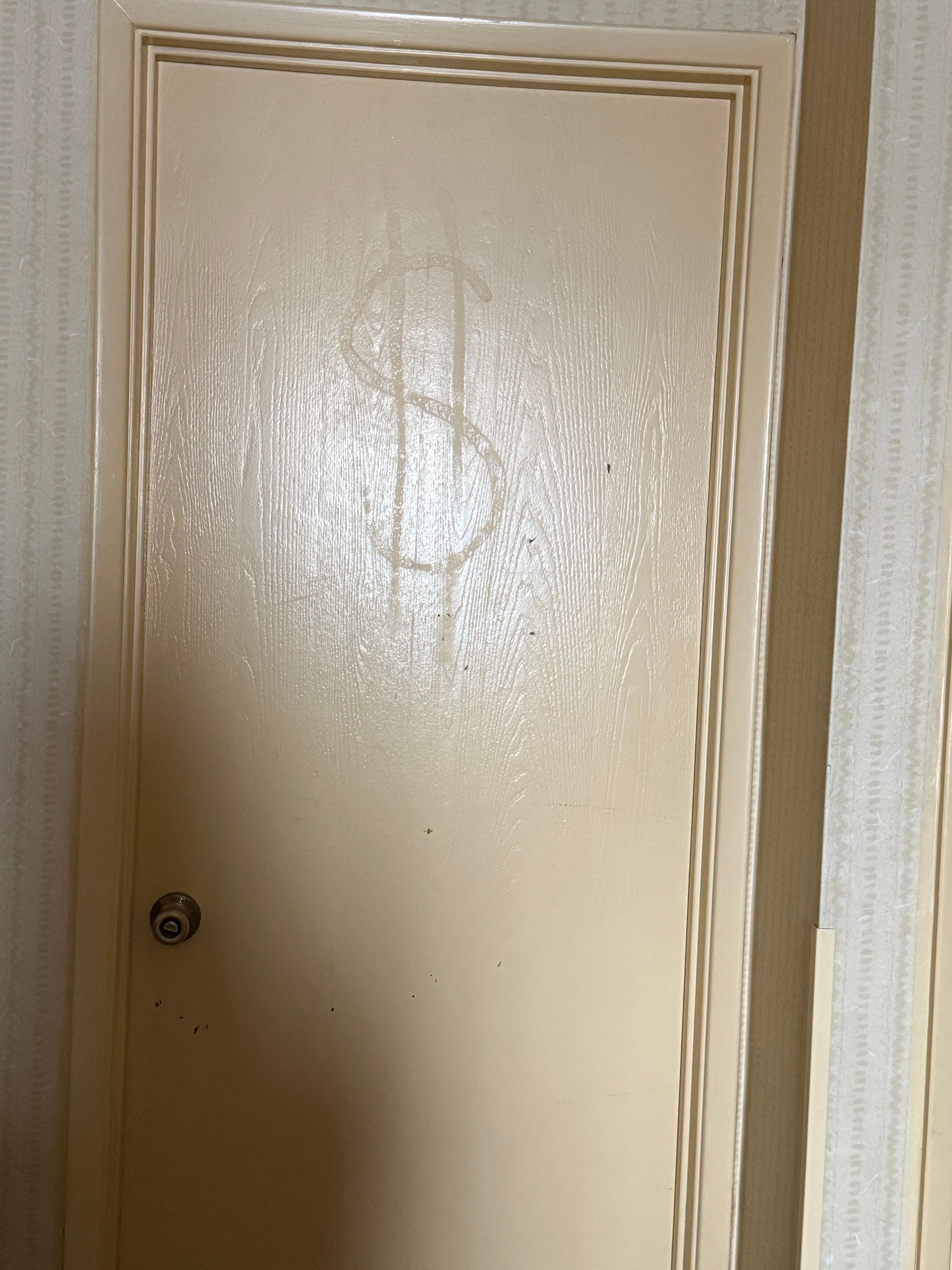 I have absolutely no idea why there is a dollar sign on the door.