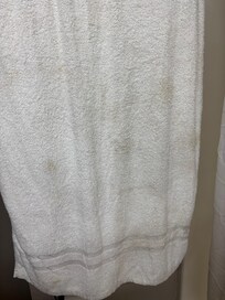 Towel….kind of speaks for itself. Stains. We did not use it, we had our own.