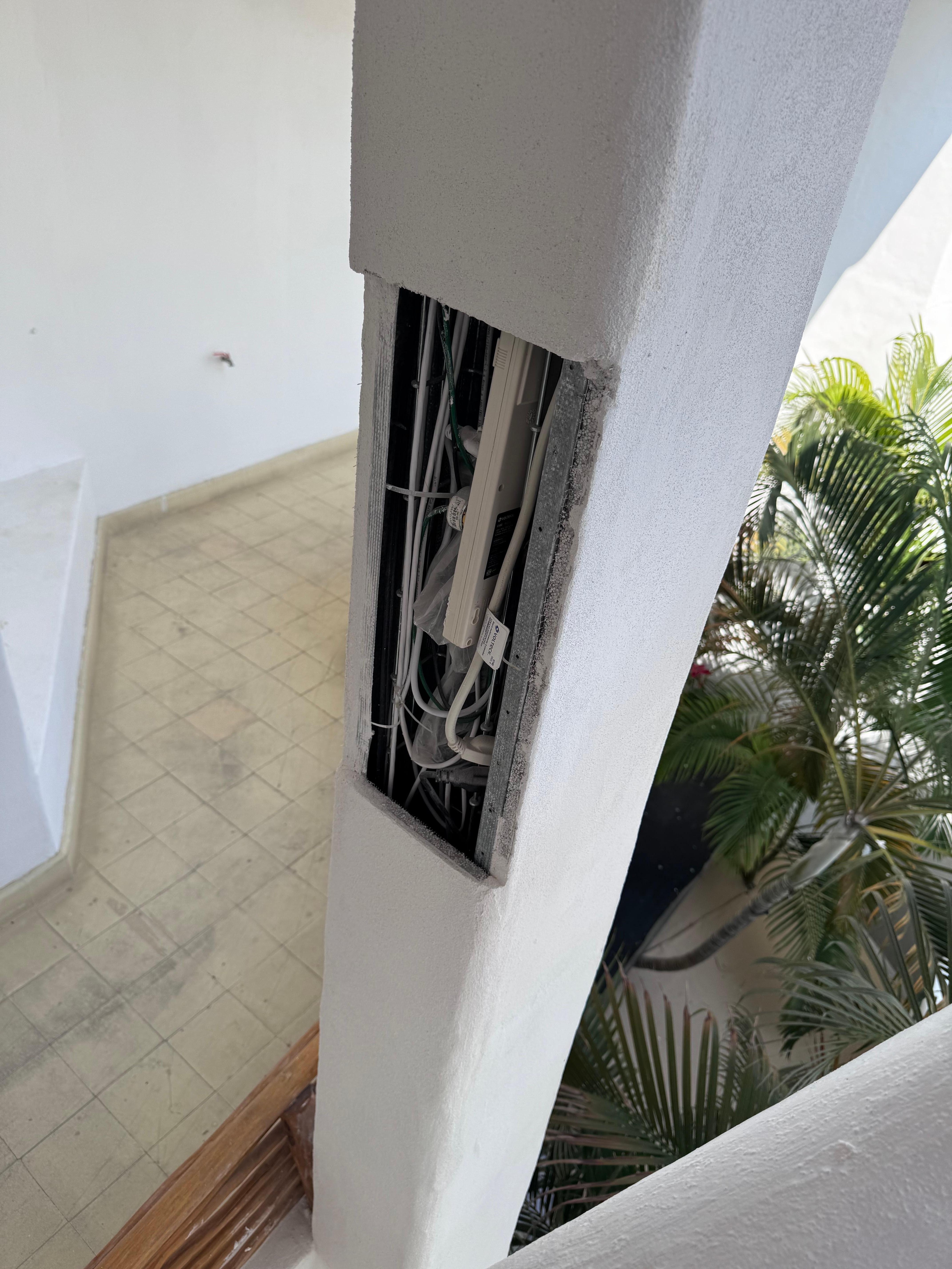 Exposed wires on the stairway