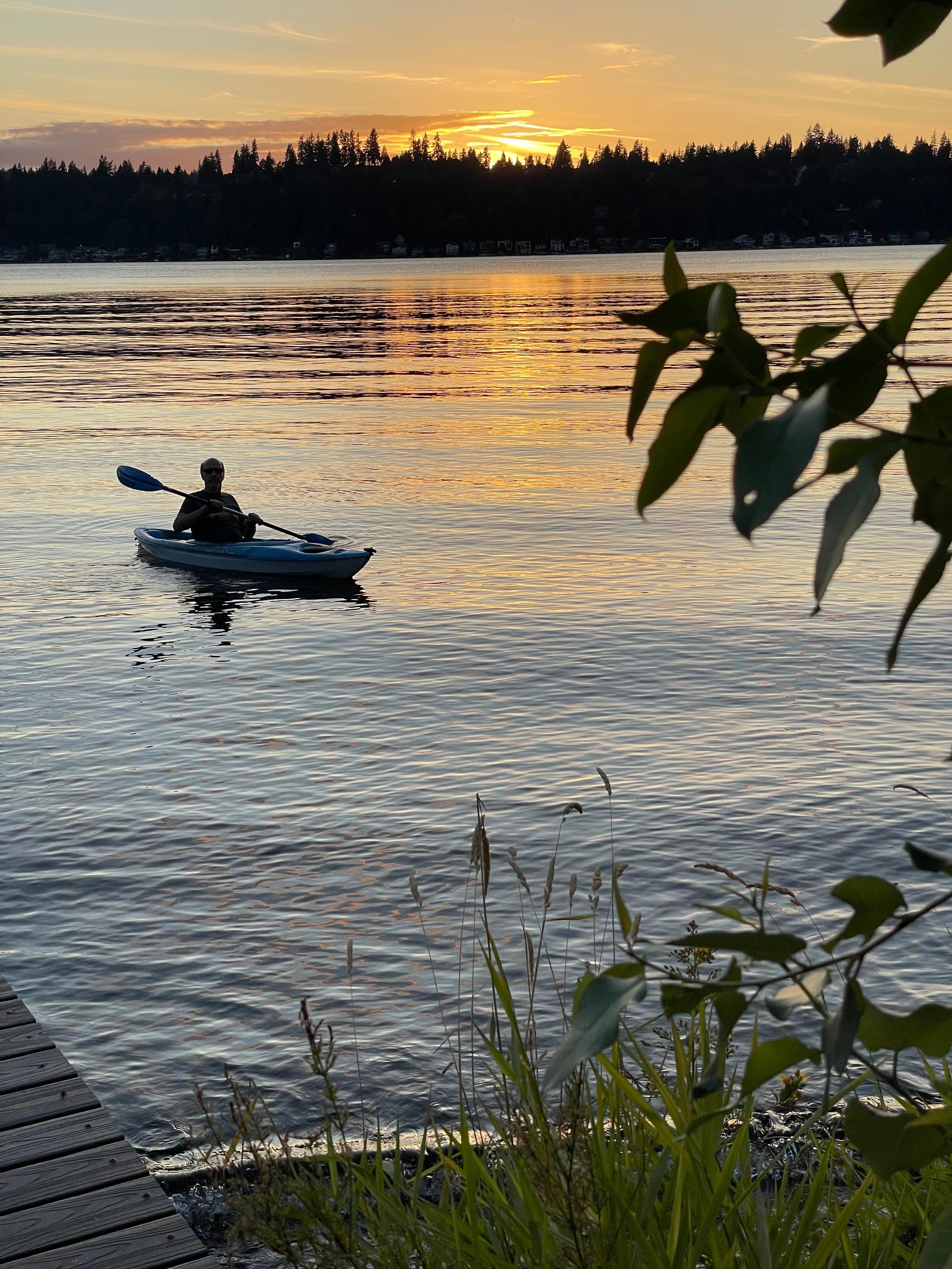 Kayaking at sunset.