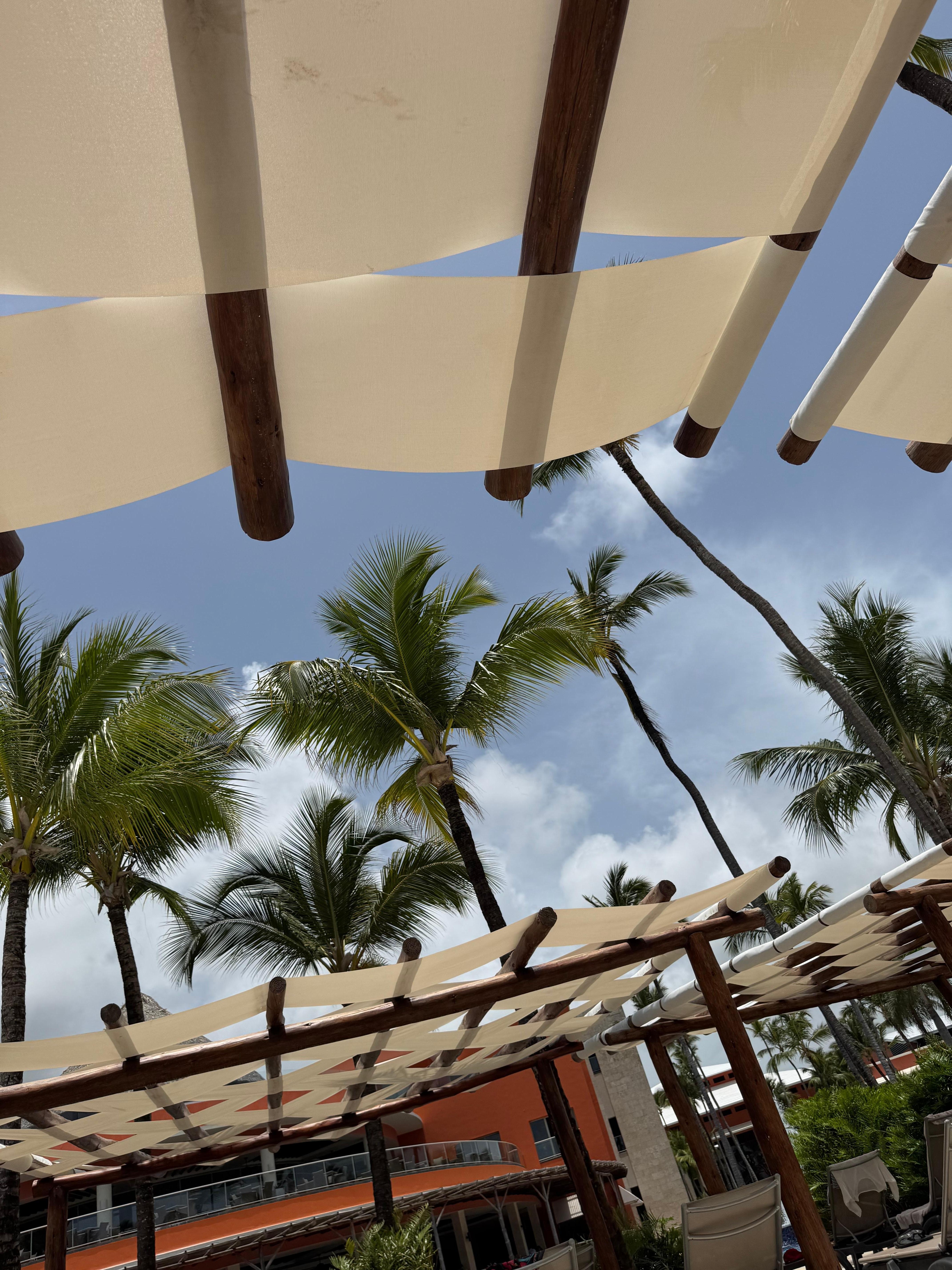 Plenty chairs by pool