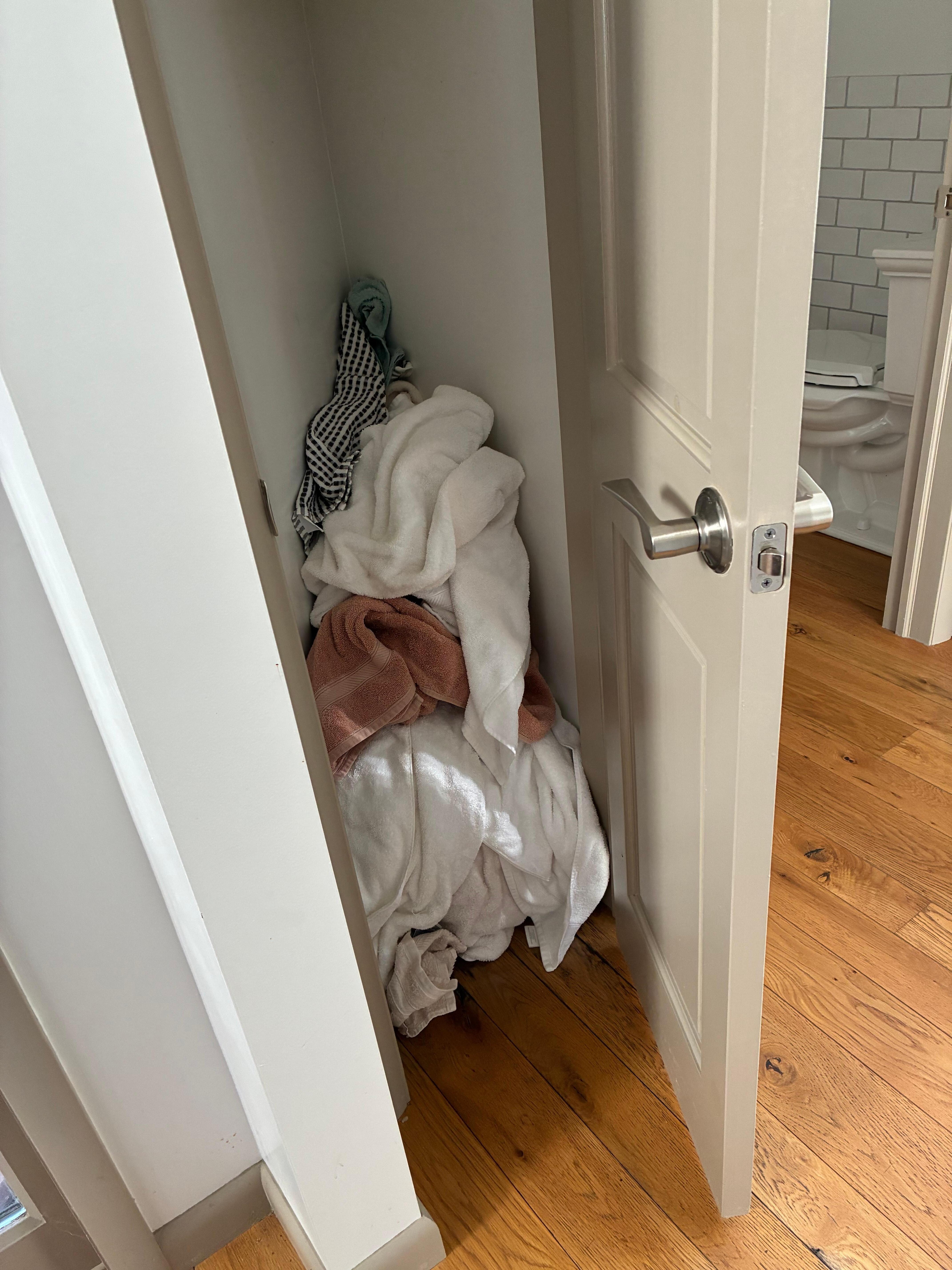 Looking for a blanket for the bed, we found closet of dirty towels.