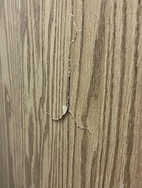 This was a cracked door to the bathroom. Clearly they have no maintenance staff or mgmt just doesn't care.