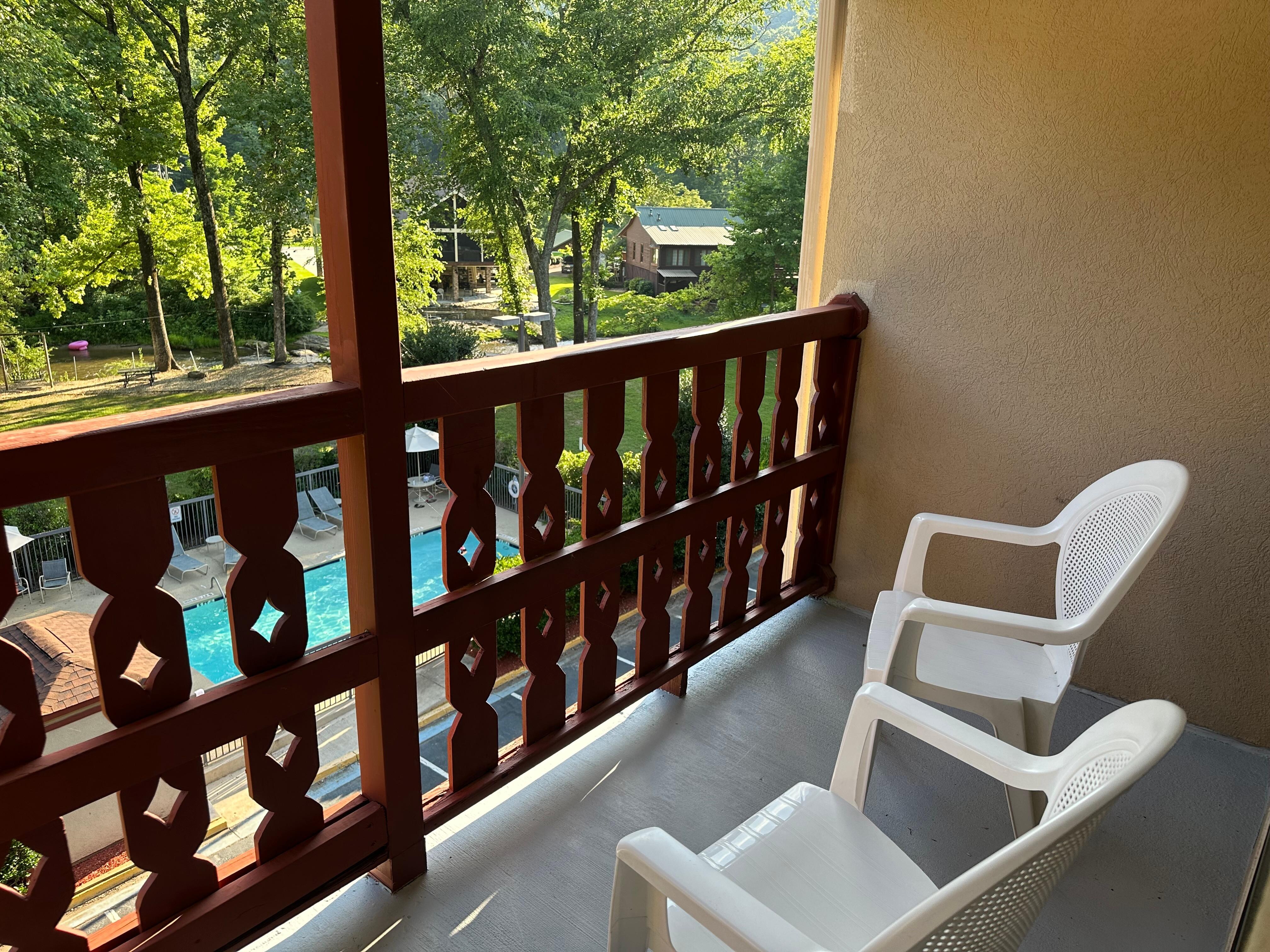 Balcony for our room with a view of the pool & river.
