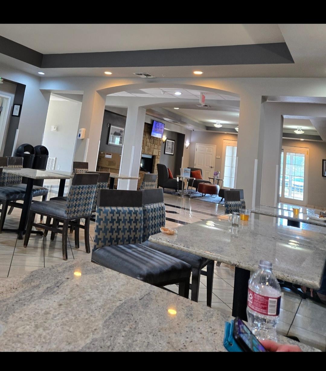 Sitting down for morning coffee and breakfast in dining area