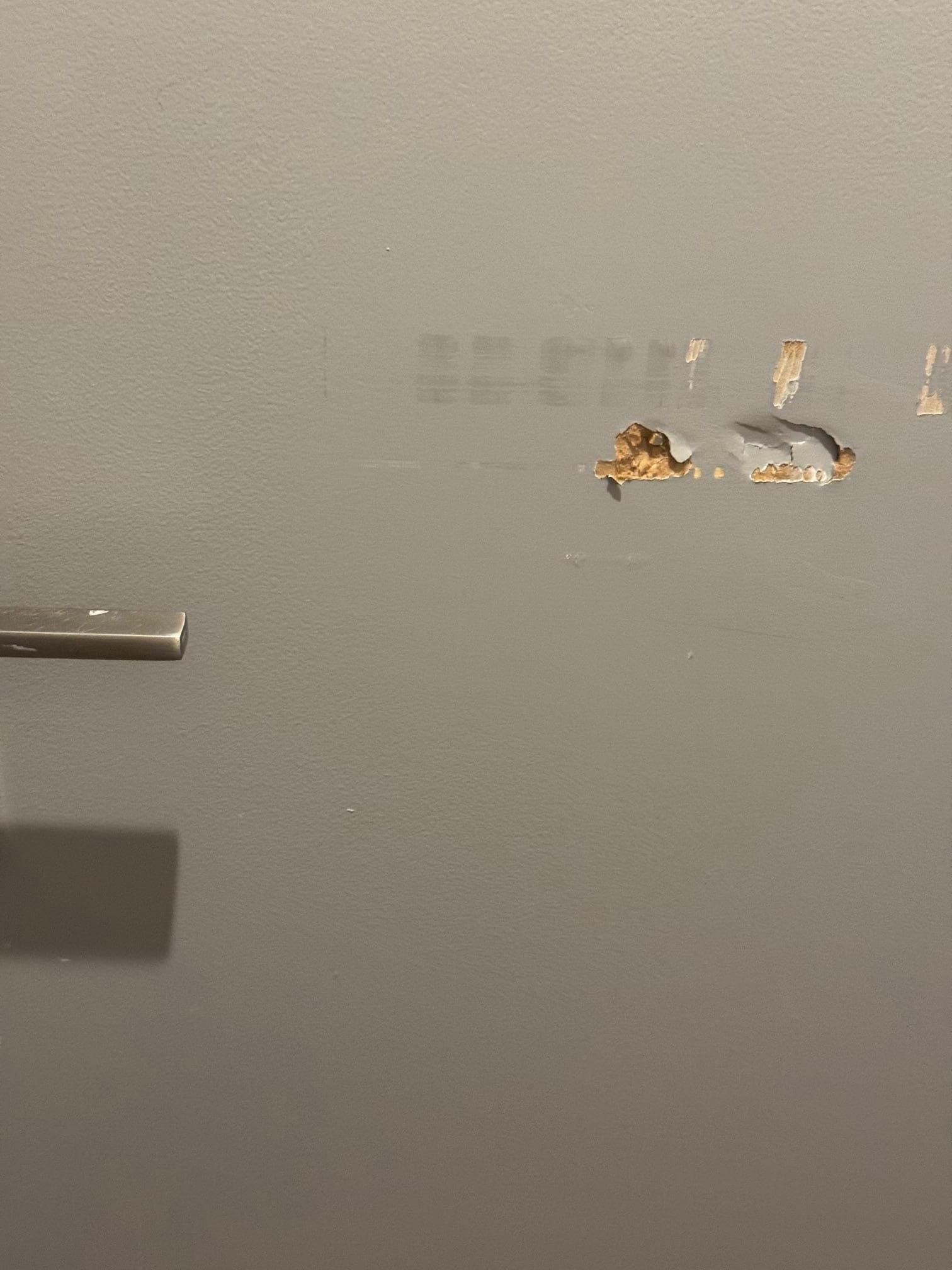 Bathroom door - nicely damaged...  3 Star?