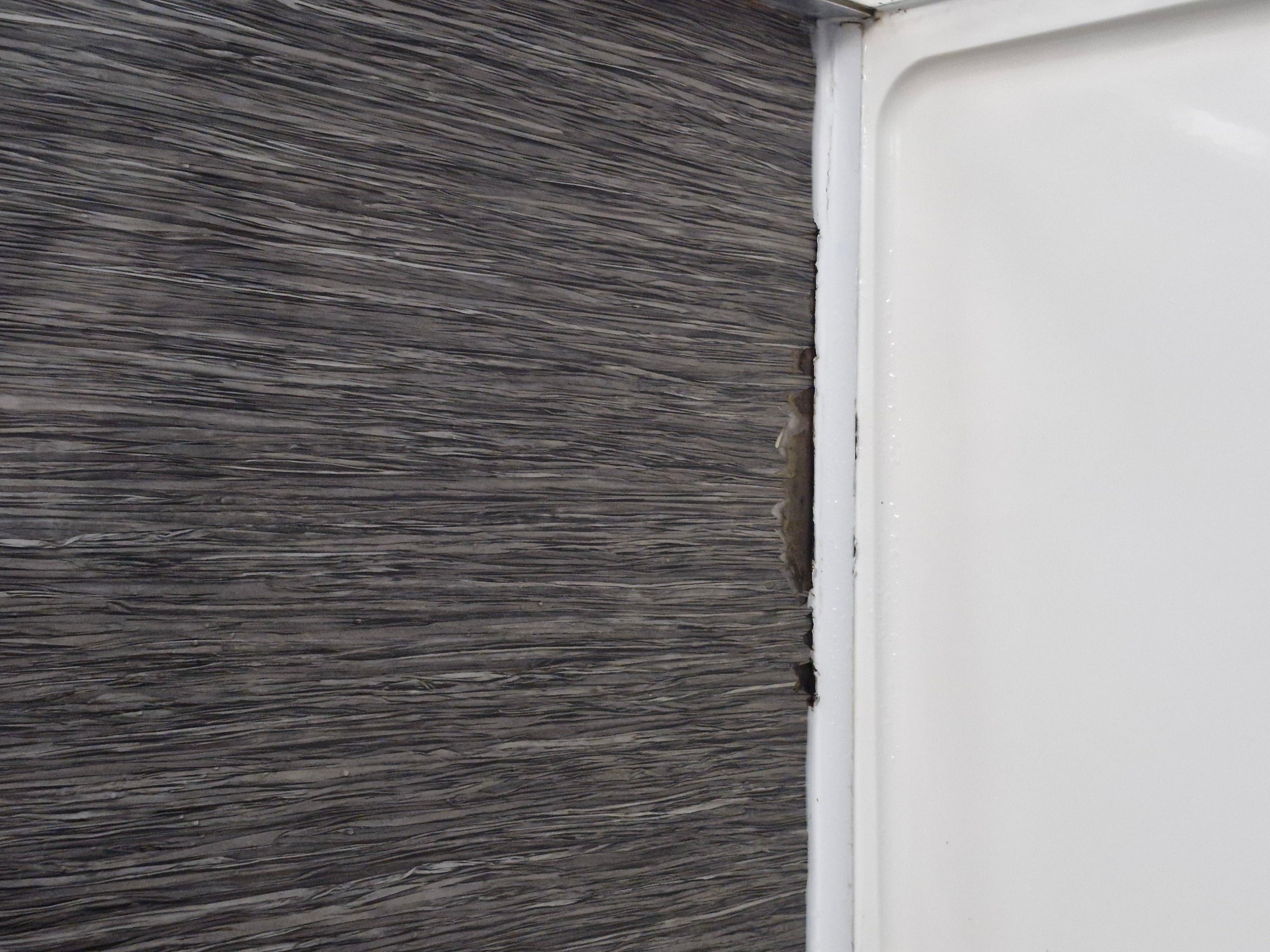 Mouldy damaged shower cubicle 