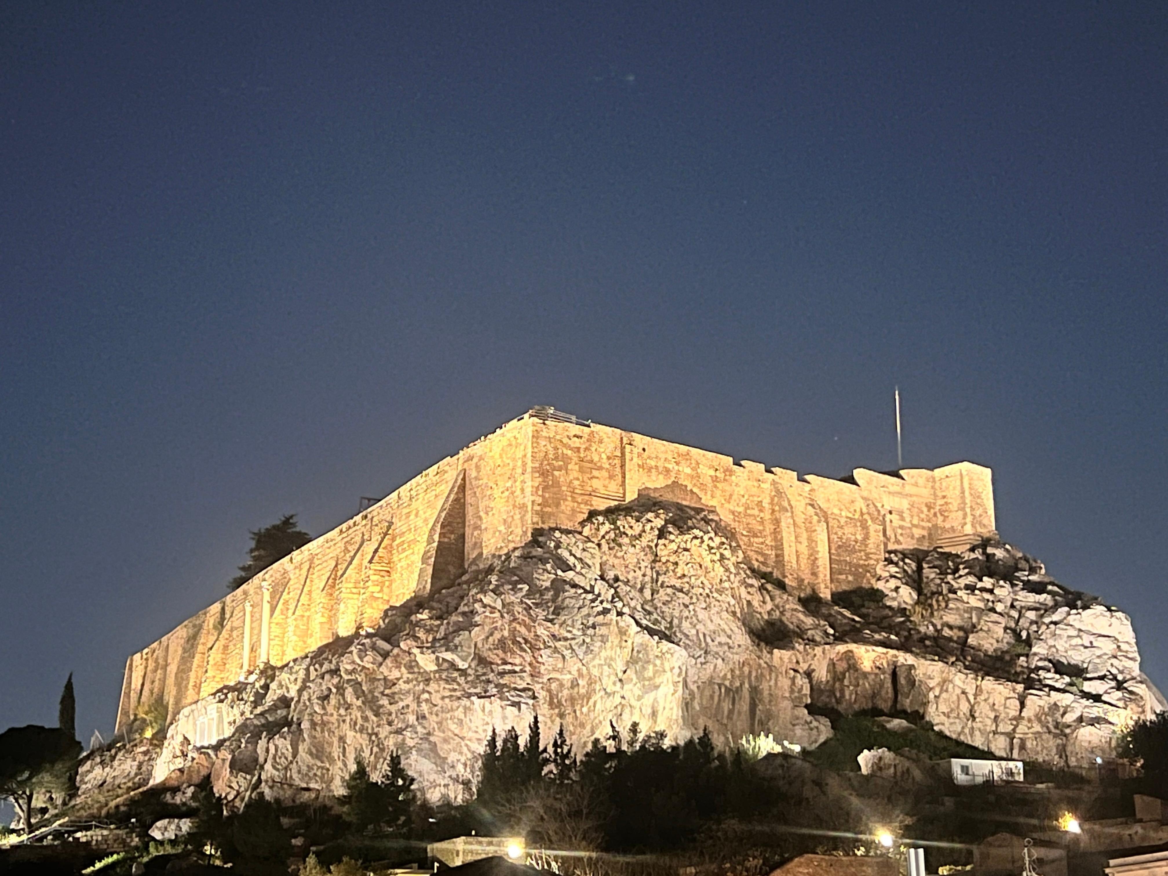 Acropolis from rooftop at night