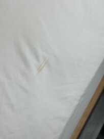 Stain on fitted sheet