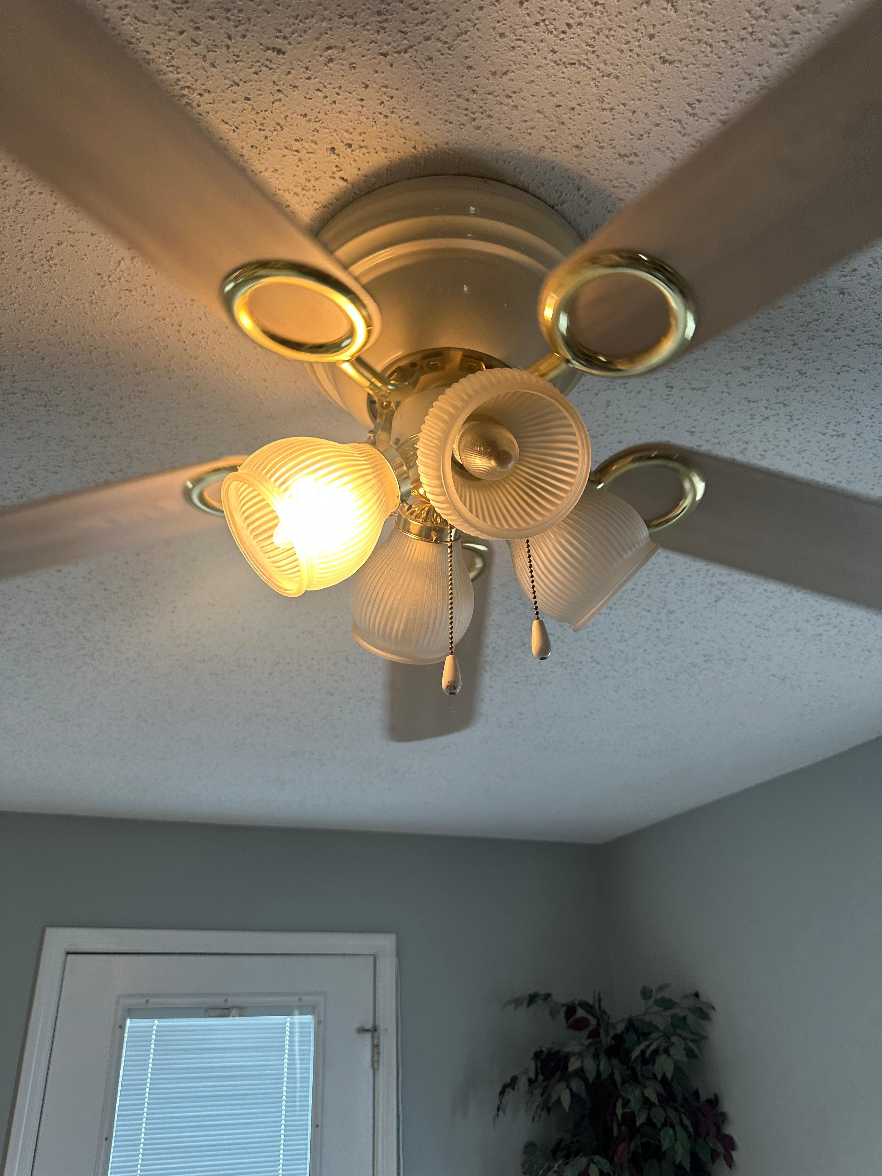 several light fixtures with burned out bulbs