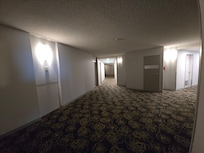 Very dark and dated corridor