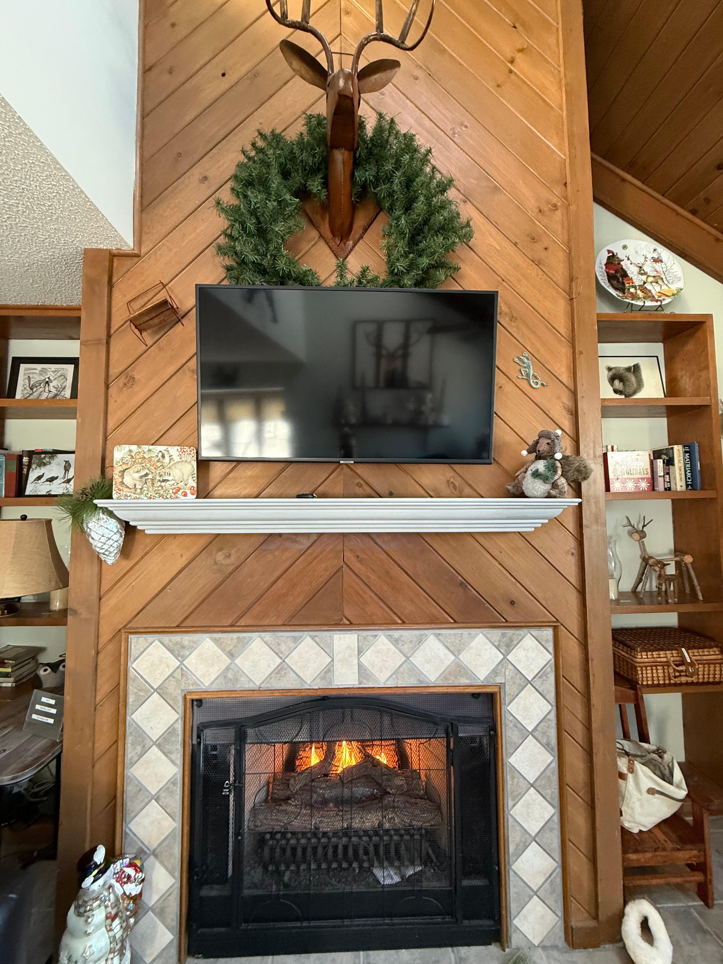 Lovely fireplace that worked really well for heating up both the down and upstairs!