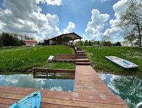 a view of the cottage from the dock