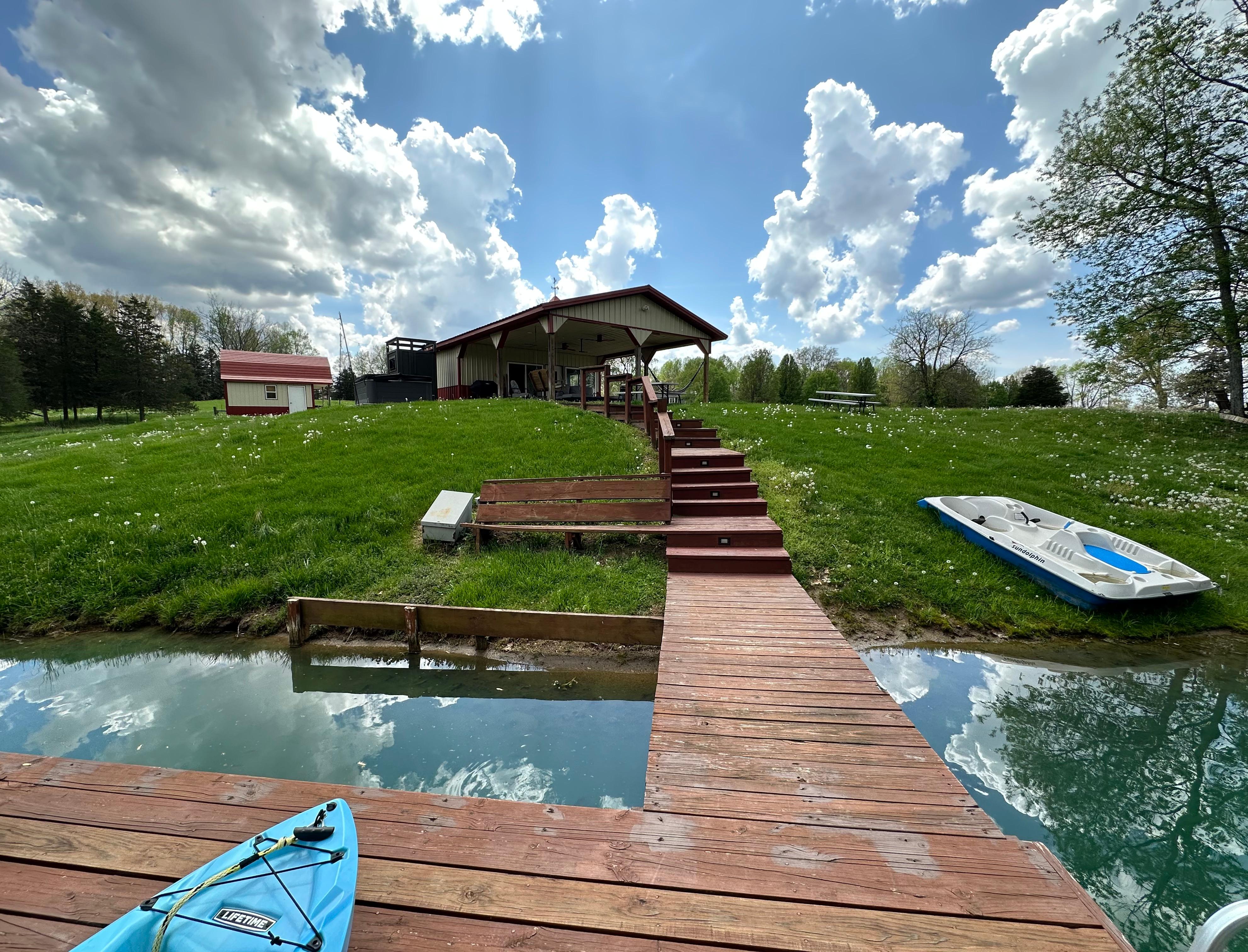 a view of the cottage from the dock