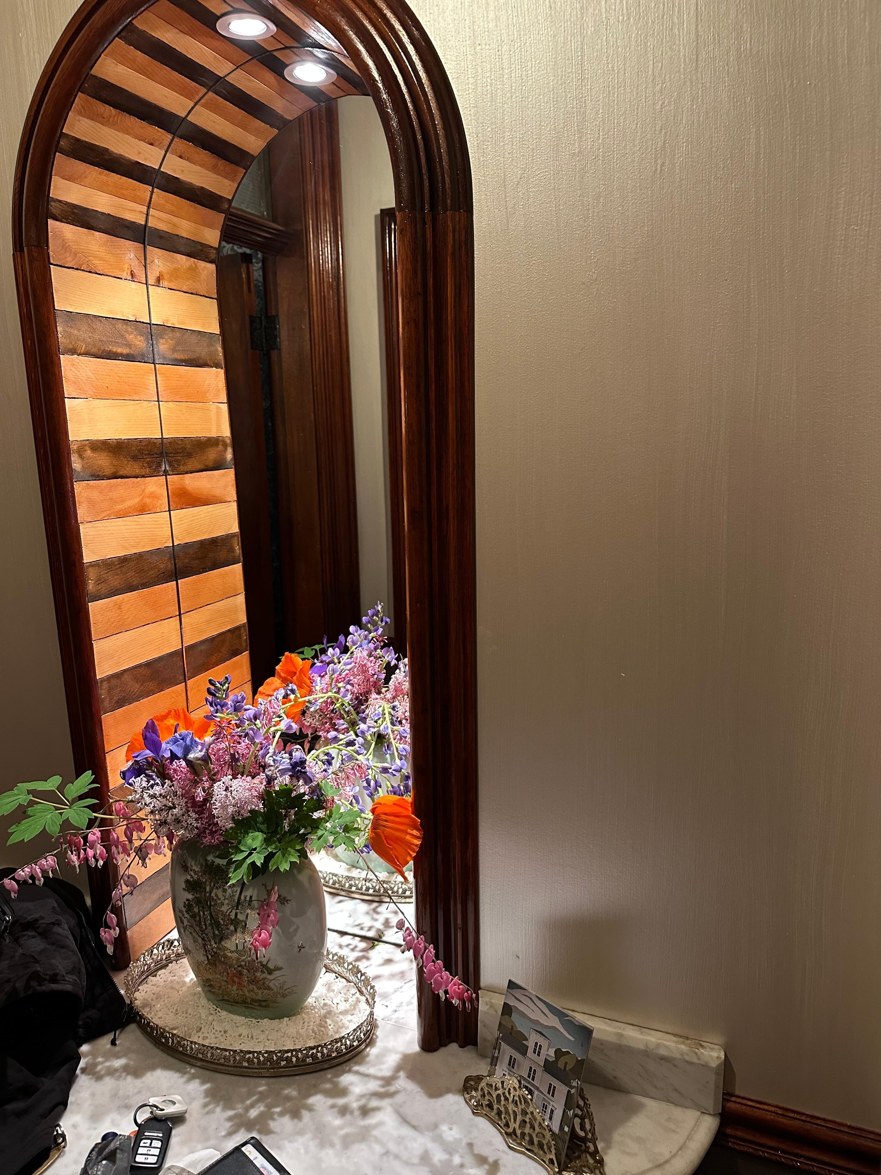 Fresh flowers in entryway. 