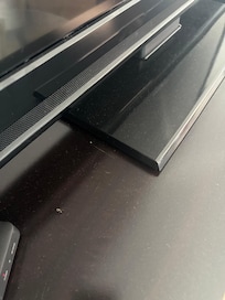 Dead flies in entertainment center