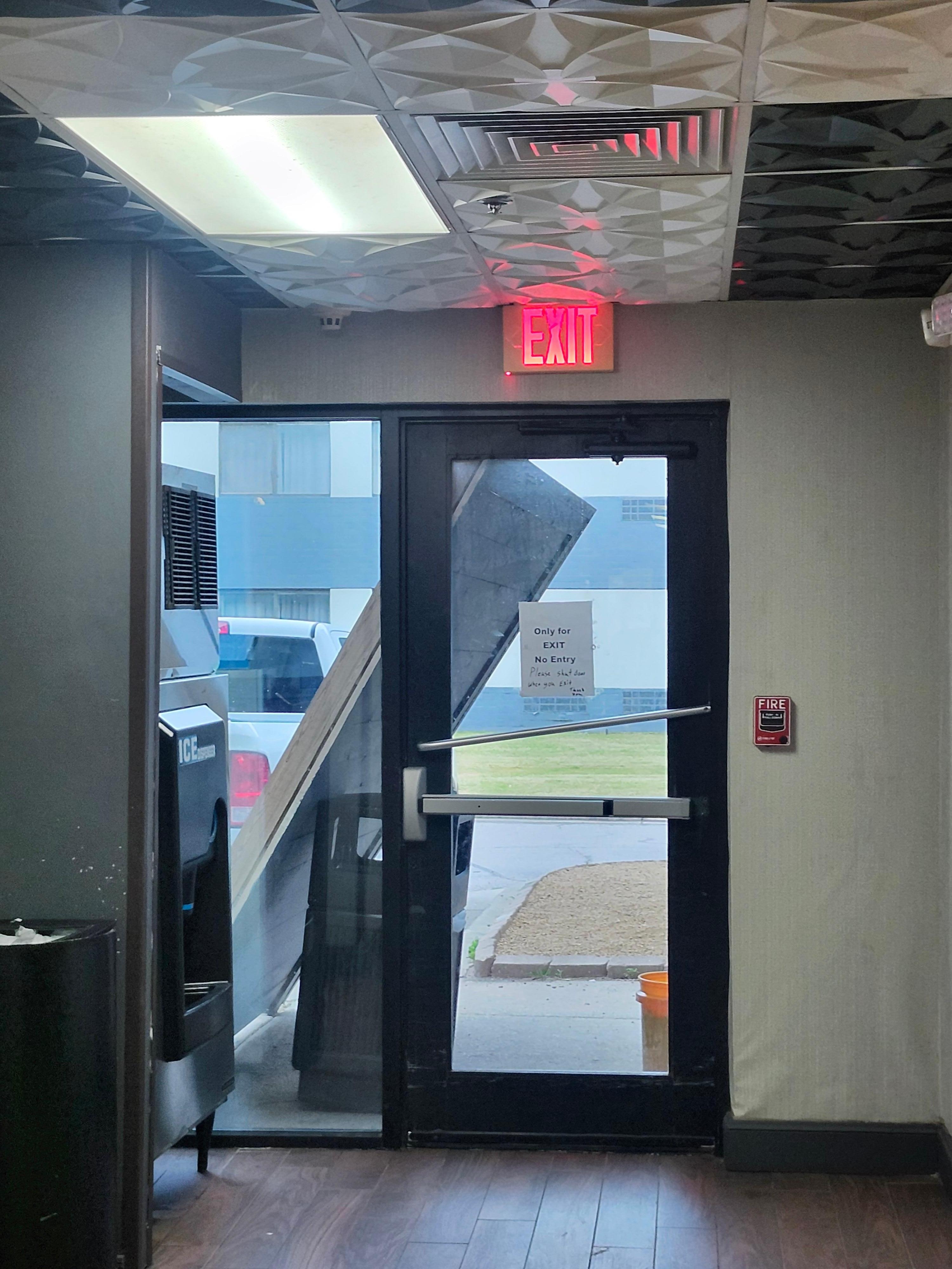 One emergency exit blocked by wall