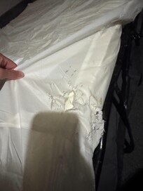 Torn up bed covers