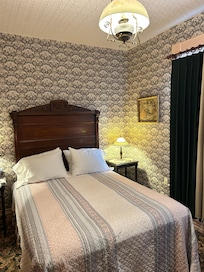 Amy’s Room. The private bathroom is down the hall.