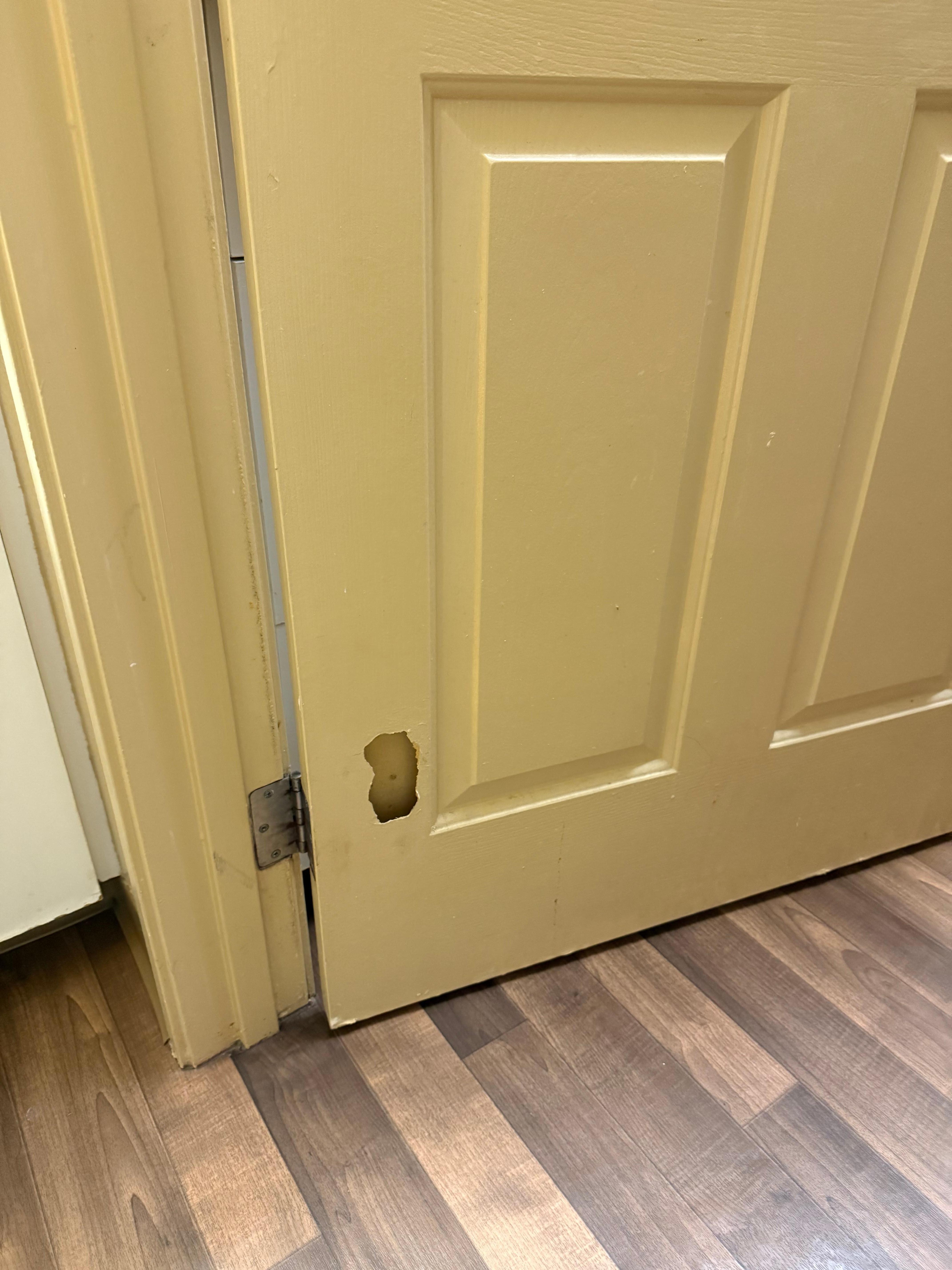 Hole in door never repaired.