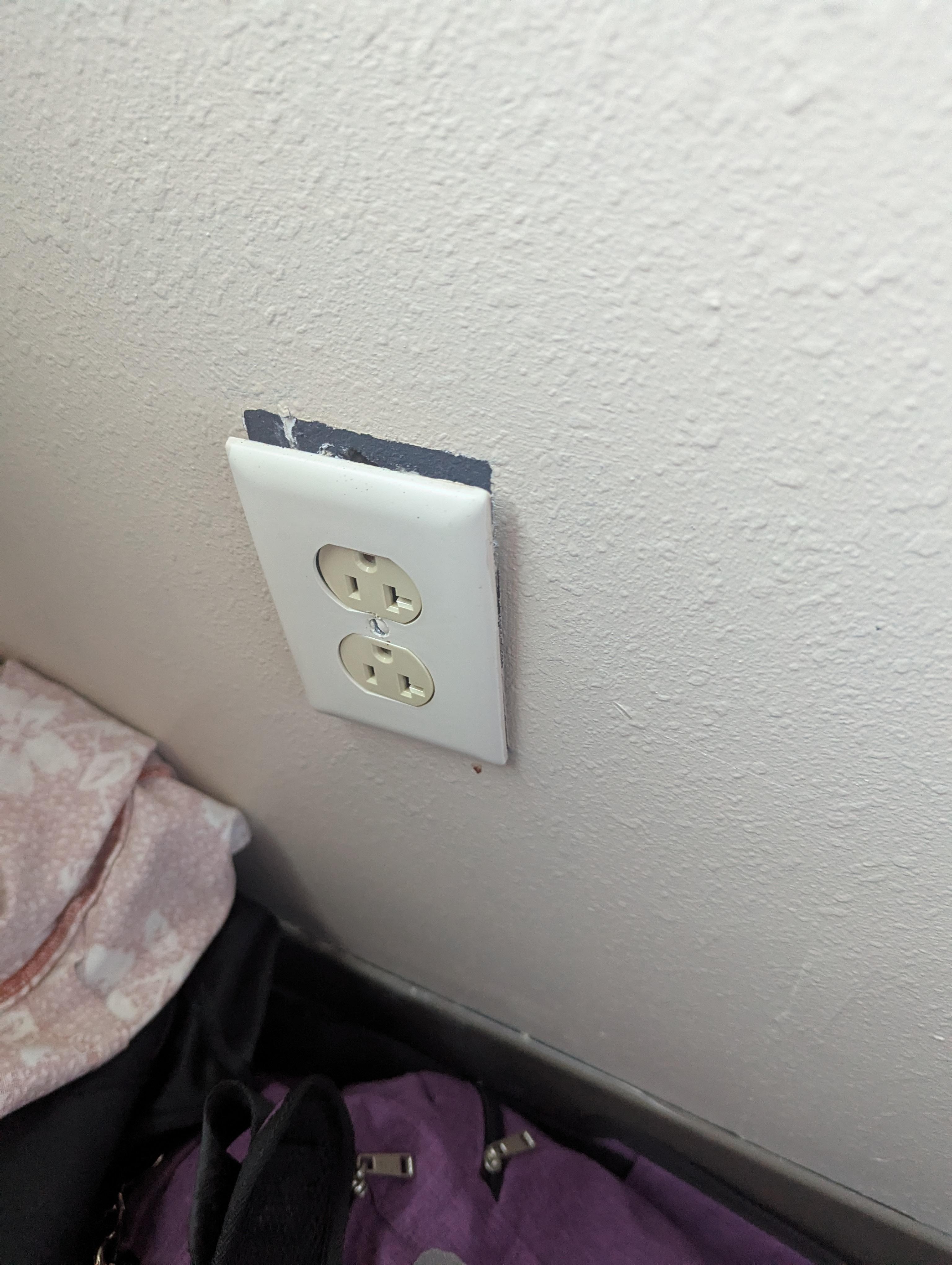 Electrical outlet separated from wall