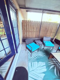 Duck eggs between fence and lanai.