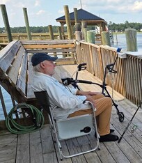 Fishing on the deck in our chair