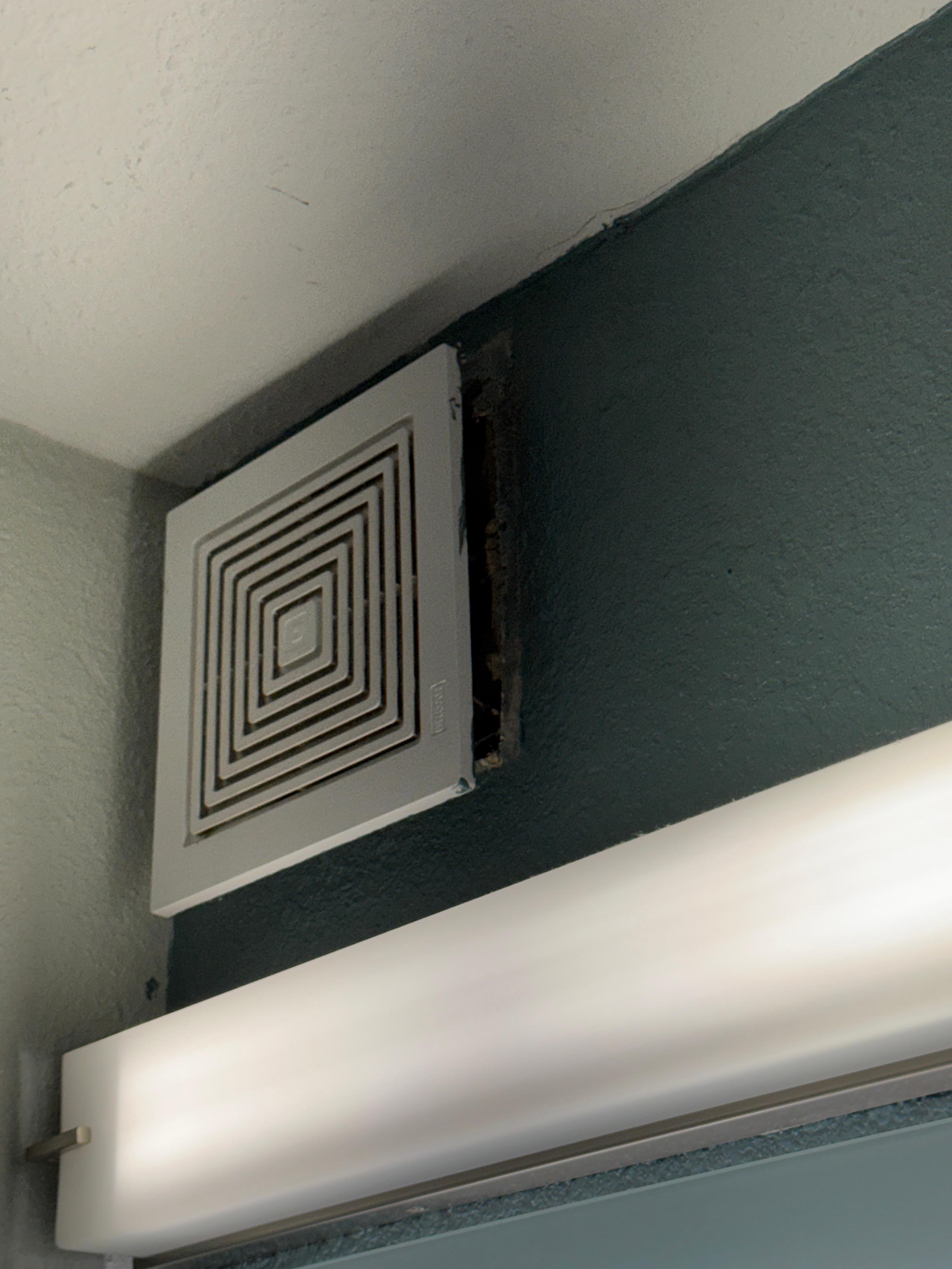 Bathroom fan coming out of the wall, very loud and very dirty. You could see the filth.