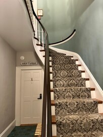 Stairs to room on third floor.