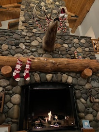 The blackbear Lodge fireplace with Christmas decorations