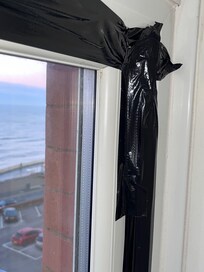 Duct tape draught excluder.