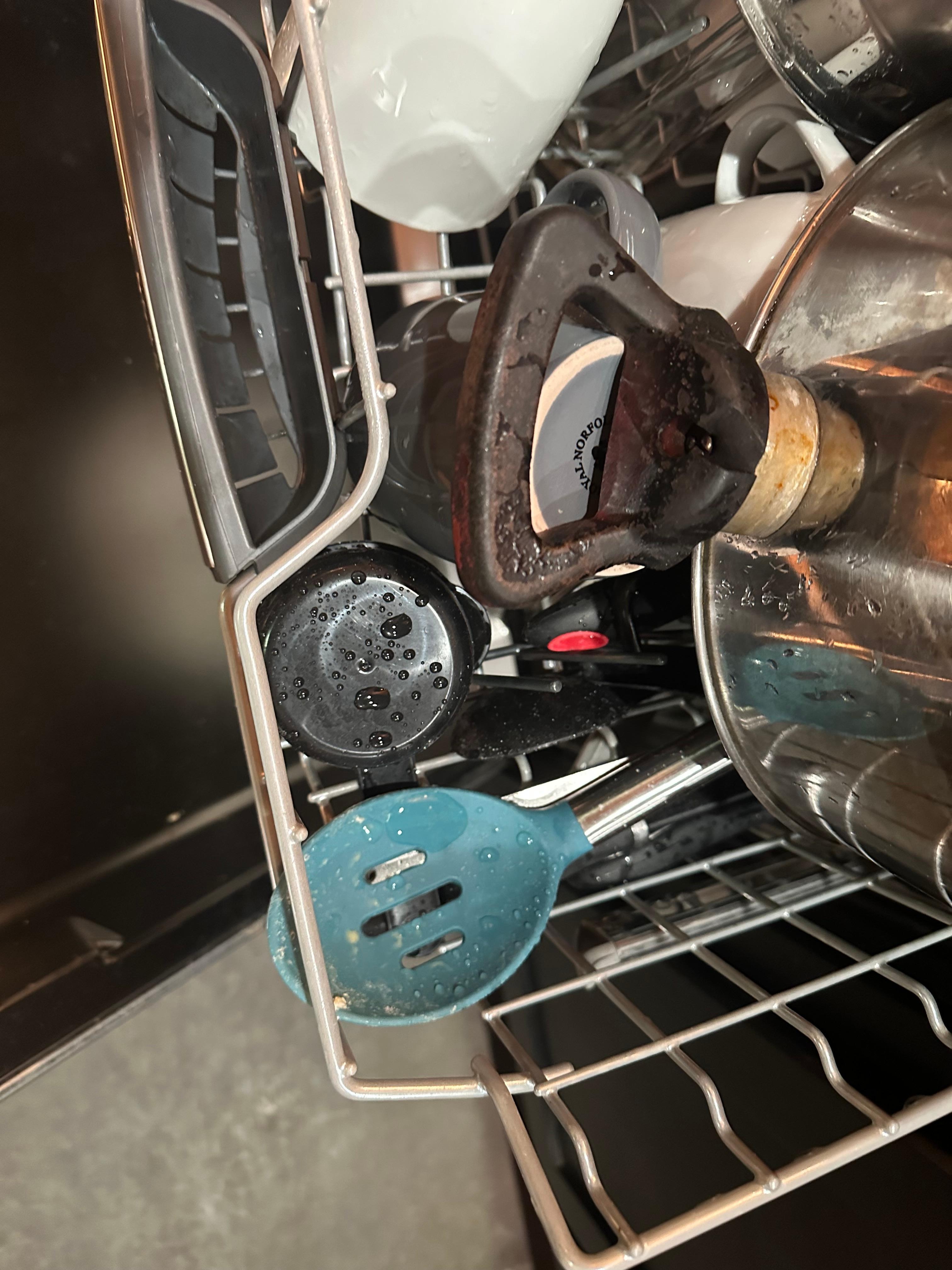 Dishes in the dishwasher upon arrival.