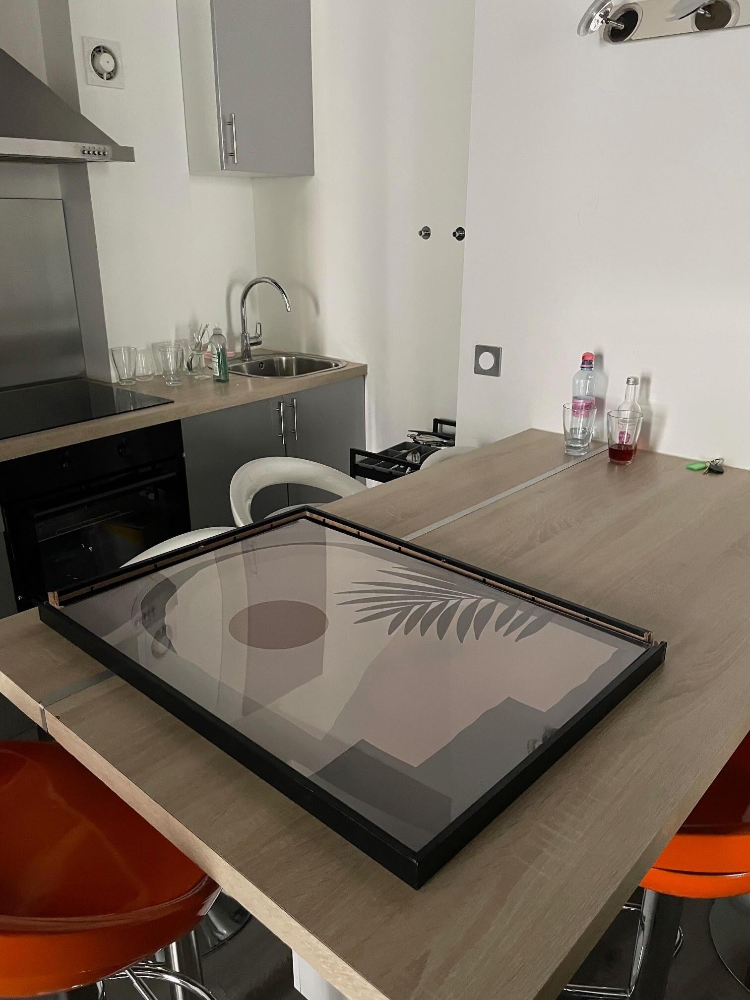 broken frame and dirty dishes