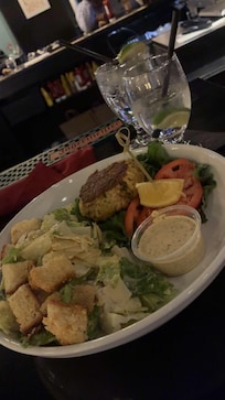 Crab cake sandwich no bun with side Cesar