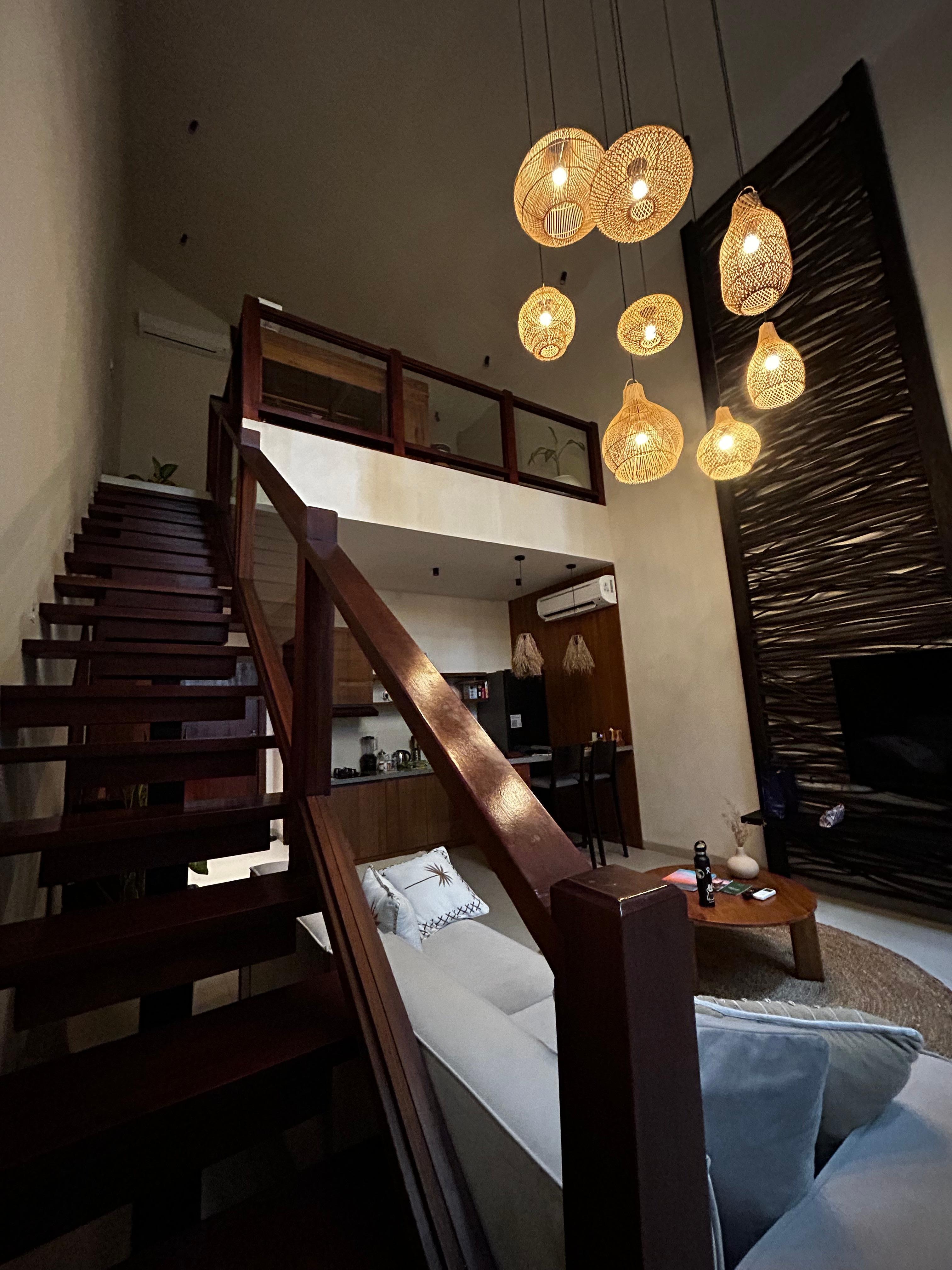 Looking up to the loft where the bed is