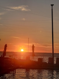 Beautiful sunsets from the pool area and the bar.