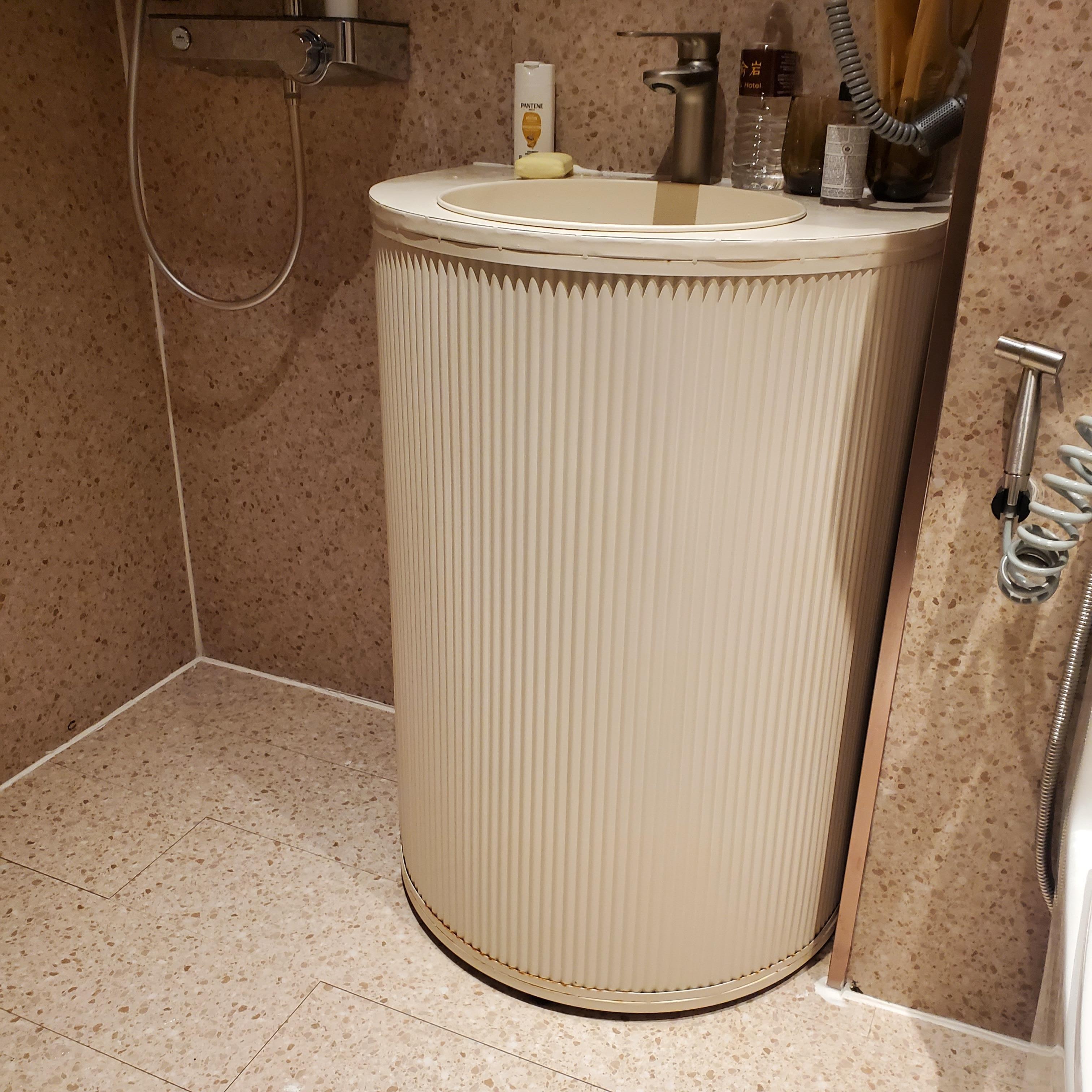 Bottom rust from shower design on newly renovated sink stands. 