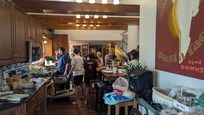 Everyone around in the kitchen together