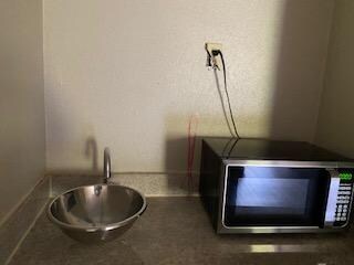 Dirty counter and wall, microwave was disgusting