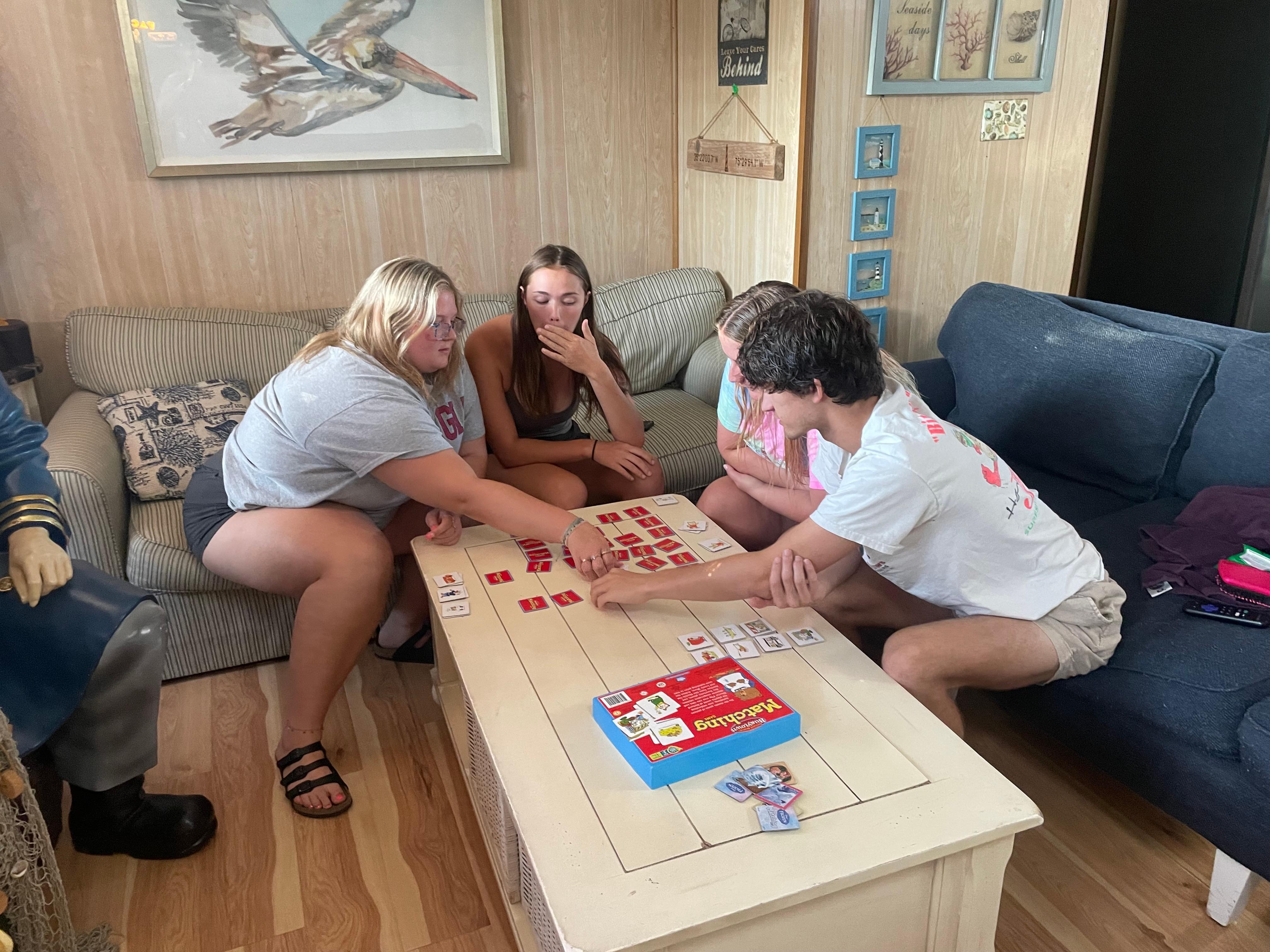 Some of the kids playing the memory game in the living room the first night!