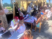 Riuland activities. Face painting, crown making and bracelets. Piñata and lunch