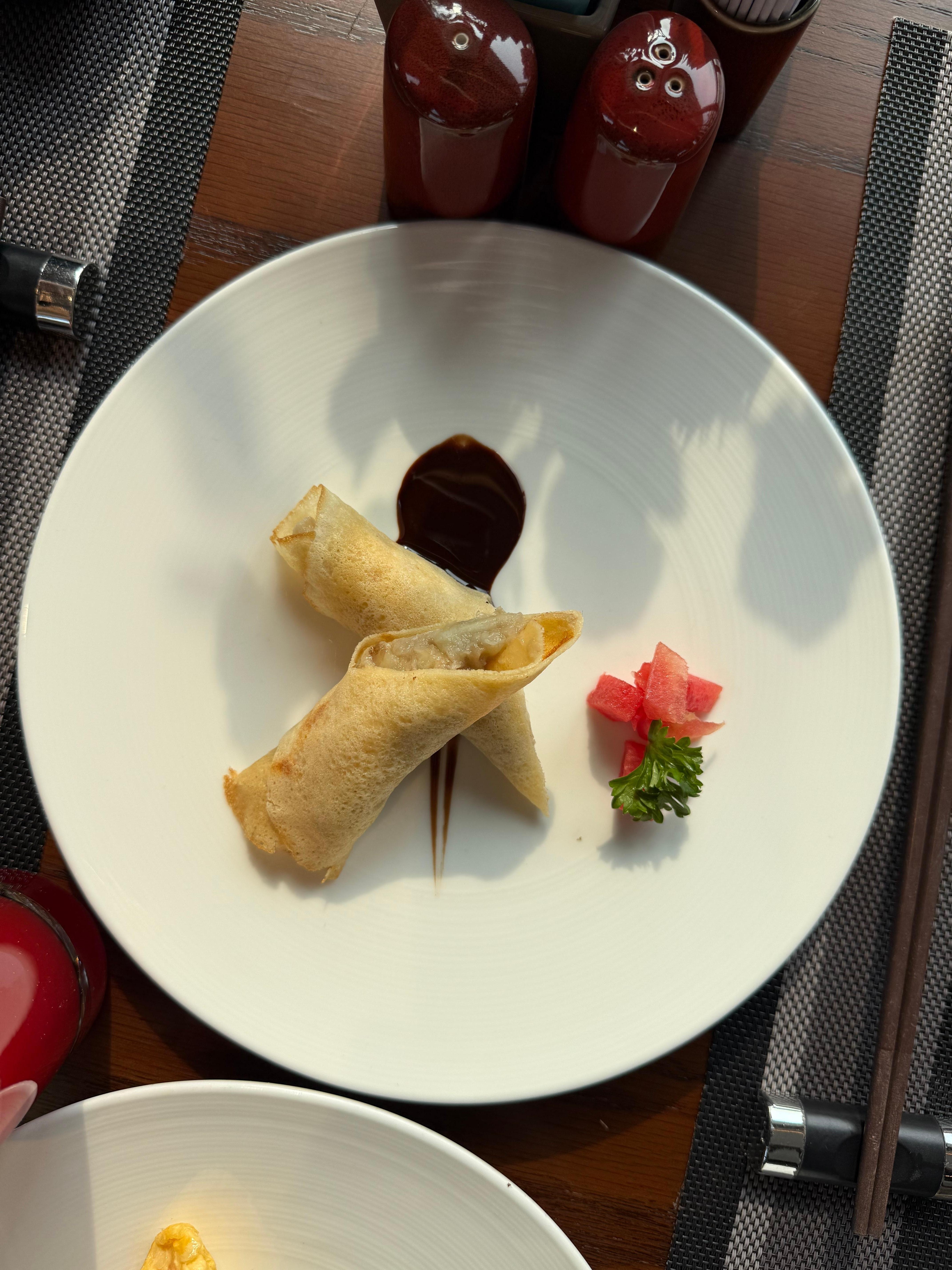 Pancake with banana beautifully presented at breakfast