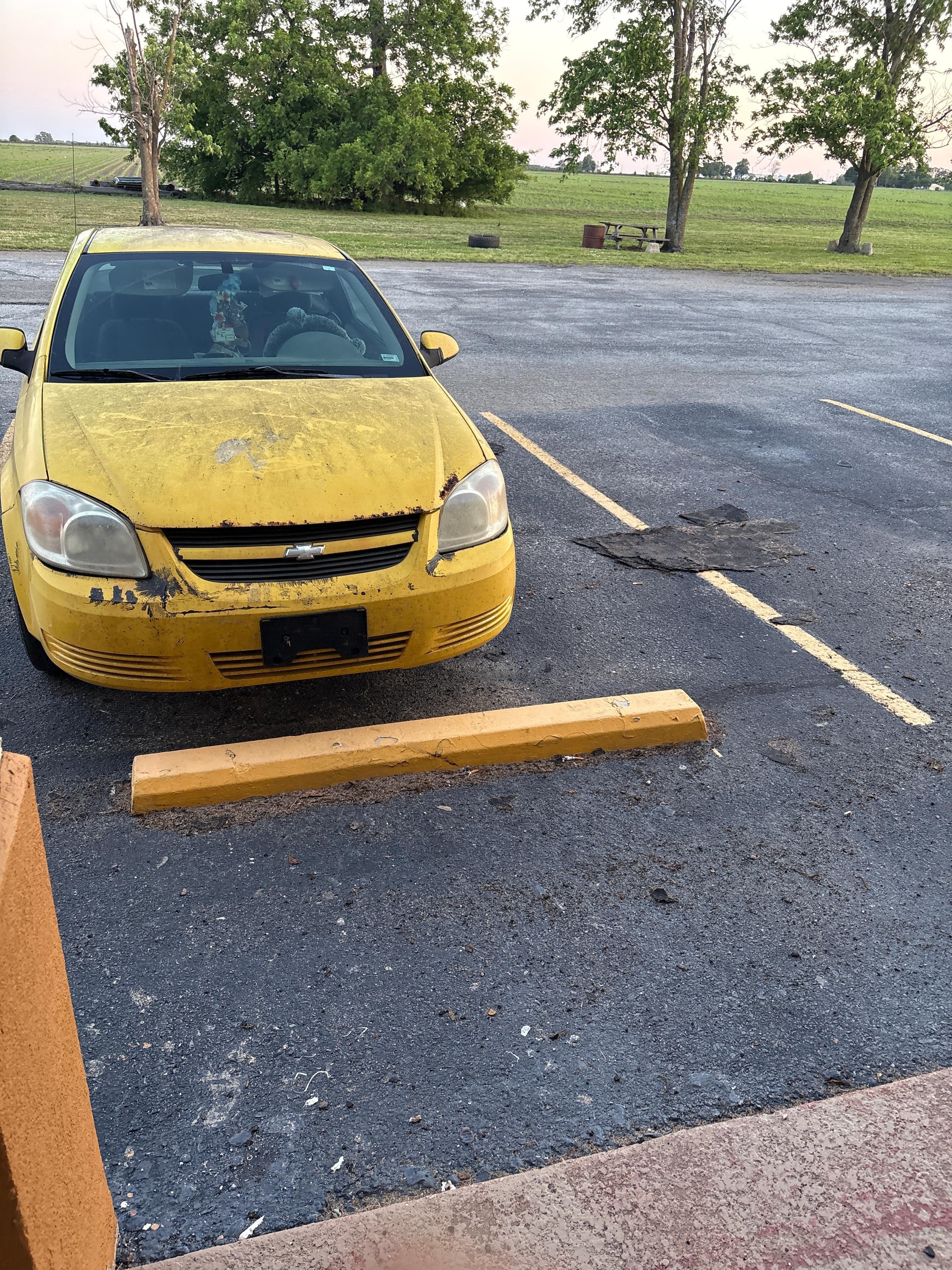 My partner’s car who drove and has a lot of damage from the storm 