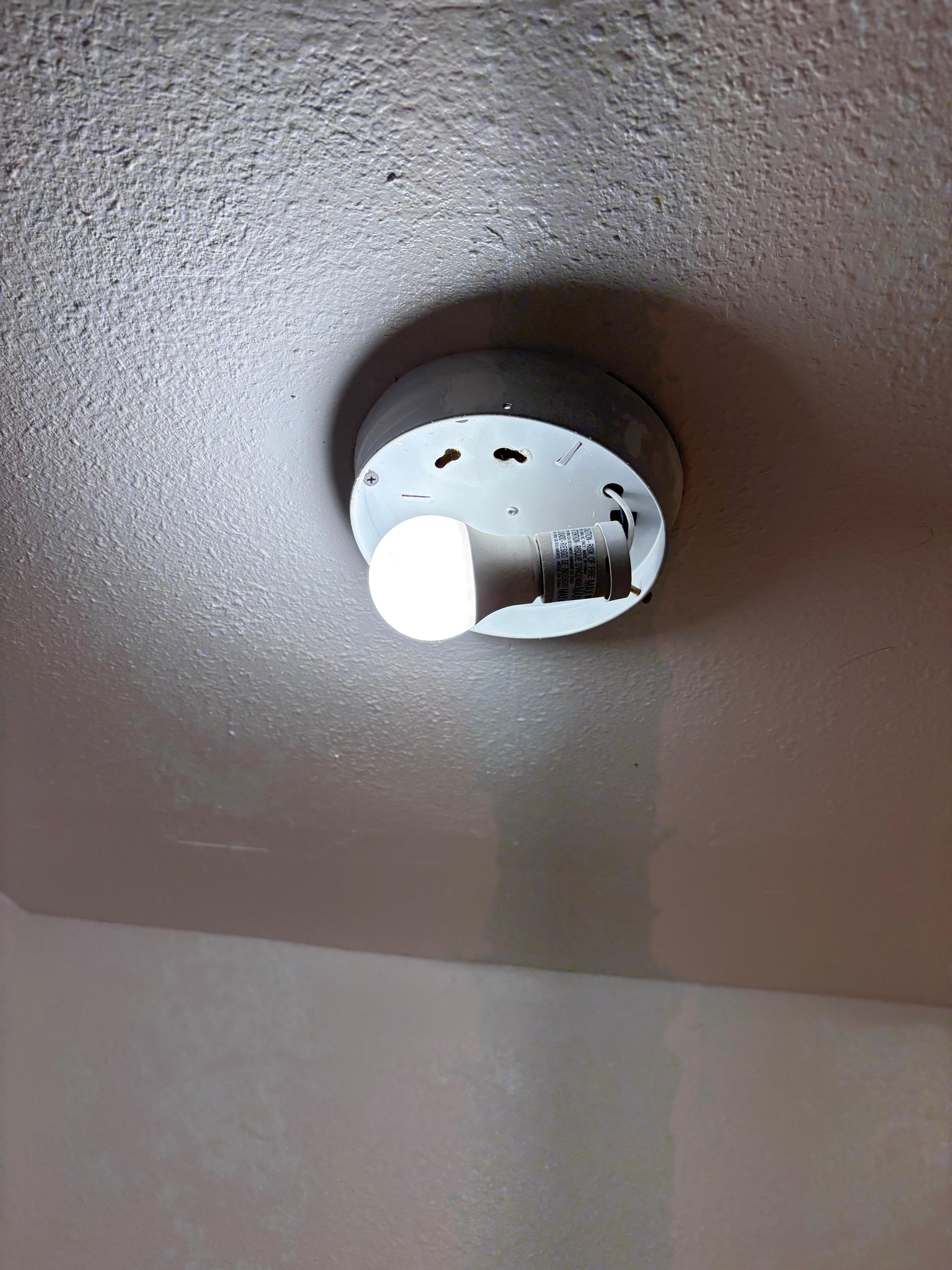 Bathroom light uncovered