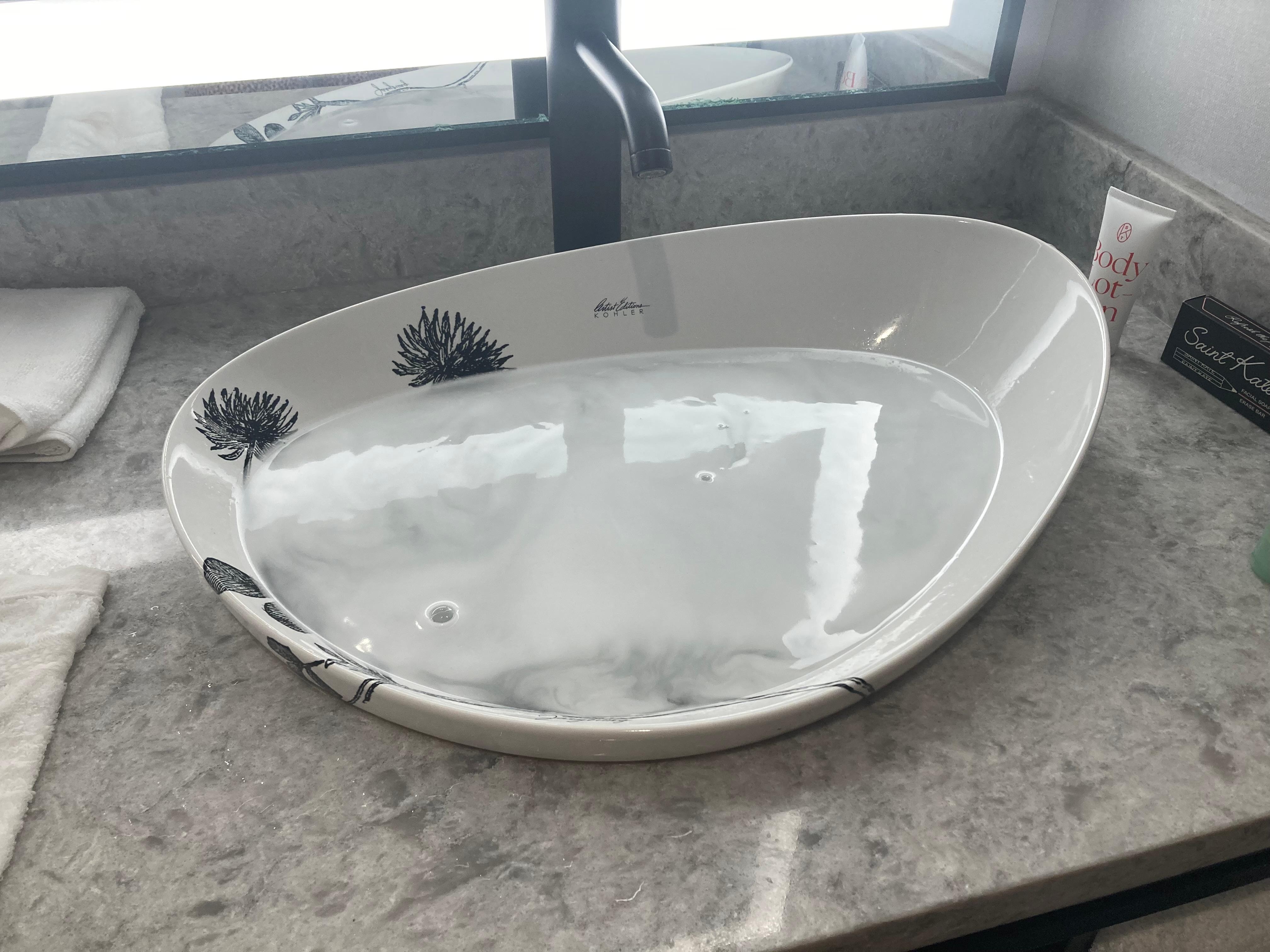 This was our sink - we had to keep  using a cup to move water to tub 