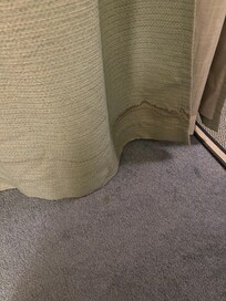 Stained curtain in the downstairs bedroom