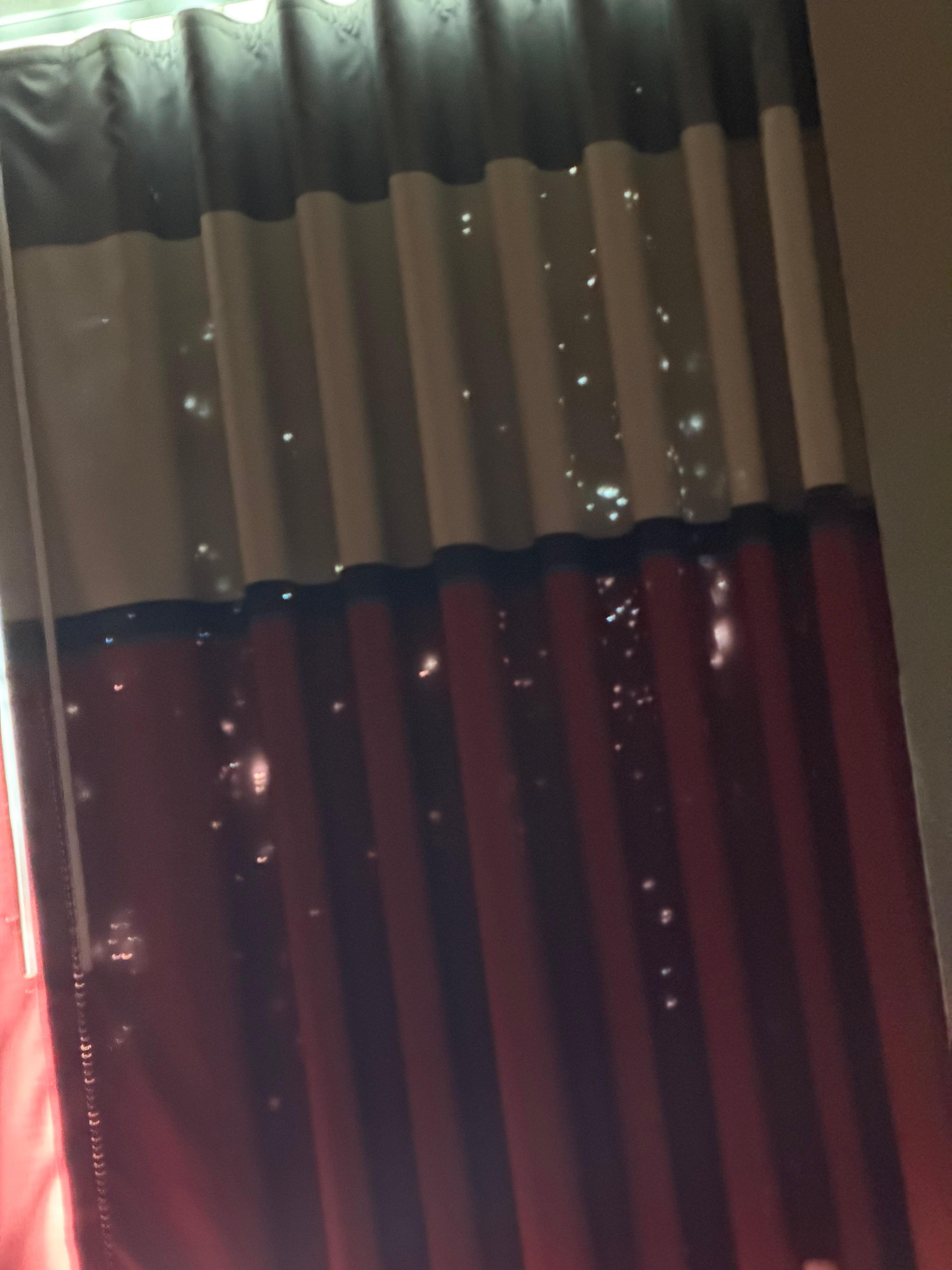 Curtains look like they were shot up with a machine gun